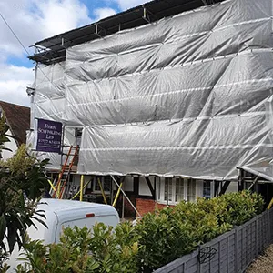large sheet over scaffolding